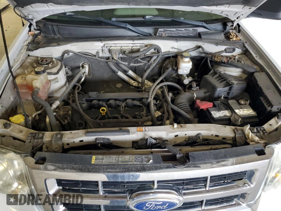2011 Ford Escape XLS с VIN 1FMCU0C78BKC53371, выставлен на аукционе Copart как лот 54767005 с пробегом 227 192 миль миль и Списание • Salvage title. История ставок и продаж доступна на DreamBid. Изображение 12.