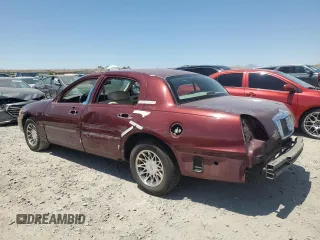 2000 Lincoln Town Car Signature with VIN 1LNHM82W2YY809189, listed as a Copart auction lot 59812665 with 148,236 mi miles and Salvage title. Bid and sale history available at DreamBid. Image 2.
