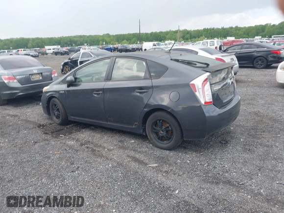 2013 Toyota Prius One with VIN JTDKN3DU8D1716993, listed as a IAAI auction lot 42202519 with 182,421 mi miles and . Bid and sale history available at DreamBid. Image 14.