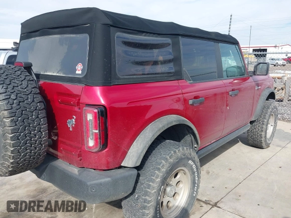 2021 Ford Bronco with VIN 1FMDE5BHXMLB01758, listed as a IAAI auction lot 41418048 with 31,652 mi miles and . Bid and sale history available at DreamBid. Image 4.