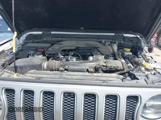 2021 Jeep Wrangler Unlimited High Altitude with VIN 1C4HJXEG3MW511185, listed as a IAAI auction lot 42125883 with 45,564 mi miles and . Bid and sale history available at DreamBid. Image 10.