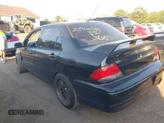 2003 Mitsubishi Lancer ES with VIN JA3AJ26EX3U015276, listed as a IAAI auction lot 37806582 with 181,069 mi miles. Bid and sale history available at carsss.com. Image 3.