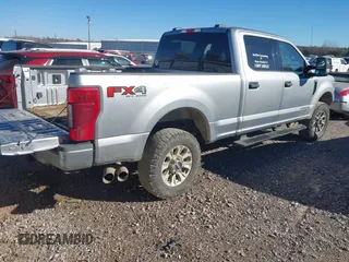 2021 Ford Super Duty F-250 SRW XL with VIN 1FT7W2BTXMEC70037, listed as a IAAI auction lot 40989388 with 109,816 mi miles. Bid and sale history available at carsss.com. Image 4.