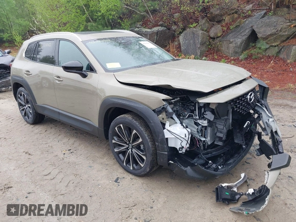 2025 Mazda CX-50 Premium z VIN 7MMVABDY2SN339010, wystawiony jako IAAI lot #42201002 z przebiegiem 36 mil mil oraz . Historia ofert i sprzedaży dostępna na DreamBid. Obrazek 1.