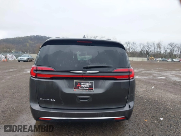 2021 Chrysler Pacifica Touring L with VIN 2C4RC1BG7MR584956, listed as a IAAI auction lot 42016887 with 51,415 mi miles and . Bid and sale history available at DreamBid. Image 17.