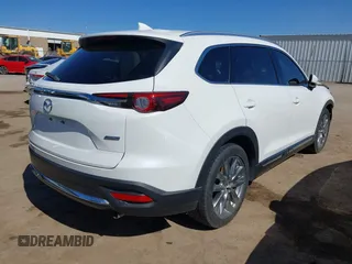 2018 Mazda CX-9 Grand Touring with VIN JM3TCADY6J0229768, listed as a IAAI auction lot 41724072 with 80,918 mi miles and . Bid and sale history available at DreamBid. Image 4.