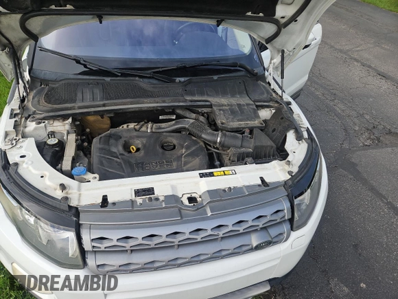 2014 Land Rover Range Rover Evoque Pure Premium z VIN SALVR2BG8EH863485, wystawiony jako Copart lot #57249785 z przebiegiem 133 937 mil mil oraz Czysty tytuł • Clean title. Historia ofert i sprzedaży dostępna na DreamBid. Obrazek 7.
