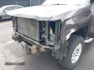 2014 Chevrolet Silverado 1500 LT with VIN 1GCRCREC5EZ161985, listed as a IAAI auction lot 42096479 with 225,412 mi miles and . Bid and sale history available at DreamBid. Image 6.