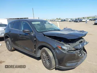 2020 Mazda CX-5 Touring z VIN JM3KFBCM4L0784602, wystawiony jako IAAI lot #42481678 z przebiegiem Nie podano mil oraz . Historia ofert i sprzedaży dostępna na DreamBid. Obrazek 1.