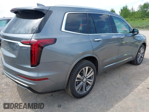 2021 Cadillac XT6 Premium Luxury with VIN 1GYKPDRS9MZ118642, listed as a IAAI auction lot 42664965 with 65,566 mi miles and . Bid and sale history available at DreamBid. Image 4.