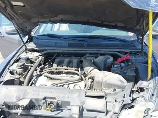 2011 Ford Taurus SEL with VIN 1FAHP2EW5BG189882, listed as a IAAI auction lot 42006542 with 208,661 mi miles. Bid and sale history available at carsss.com. Image 10.