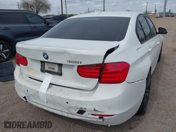 2015 BMW 3 Series 328i with VIN WBA3A5G55FNS85277, listed as a IAAI auction lot 41593498 with 128,265 mi miles and . Bid and sale history available at carsss.com. Image 4.