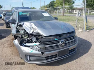2024 Volkswagen Jetta Sport with VIN 3VWBM7BU1RM077148, listed as a IAAI auction lot 42062721 with 22,495 mi miles and . Bid and sale history available at DreamBid. Image 1.