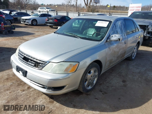 2003 Toyota Avalon XL z VIN 4T1BF28B43U323789, wystawiony jako IAAI lot #41416715 z przebiegiem 178 295 mil mil oraz . Historia ofert i sprzedaży dostępna na DreamBid. Obrazek 2.