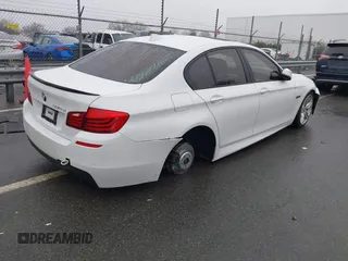 2014 BMW 5 Series 535d with VIN WBAXA5C58ED690612, listed as a IAAI auction lot 41570616 with 95,124 mi miles and . Bid and sale history available at carsss.com. Image 4.