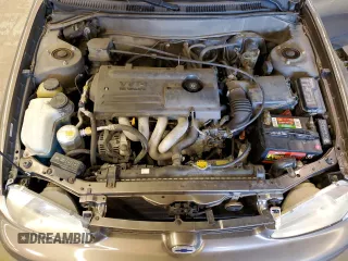 2000 Chevrolet Prizm z VIN 1Y1SK528XYZ429393, wystawiony jako Copart lot #46506584 z przebiegiem 78 028 mil mil oraz Tytuł czysty. Historia ofert i sprzedaży dostępna na DreamBid. Obrazek 11.