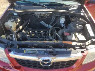 2010 Mazda Tribute Touring with VIN 4F2CY9C77AKM04941, listed as a Copart auction lot 50802955 with 118,480 mi miles and Salvage Title. Bid and sale history available at carsss.com. Image 13.
