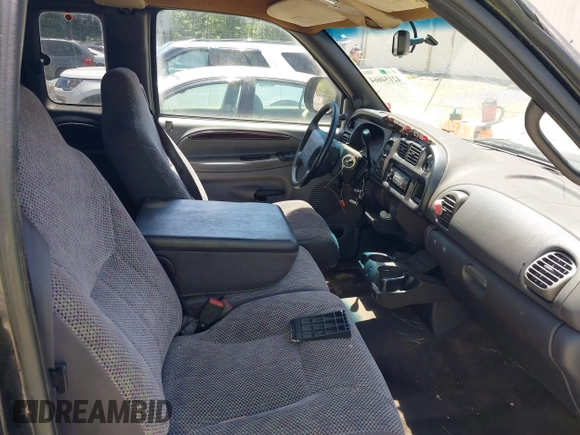 1999 Dodge 1500 with VIN 3B7HC13Z2XG125842, listed as a IAAI auction lot 42154664 with 152,871 mi miles and . Bid and sale history available at DreamBid. Image 5.