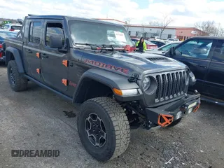 2021 Jeep Gladiator Mojave z VIN 1C6JJTEG2ML515456, wystawiony jako IAAI lot #41976059 z przebiegiem 109 225 mil mil oraz . Historia ofert i sprzedaży dostępna na DreamBid. Obrazek 1.