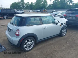 2011 MINI Hardtop with VIN WMWSU3C5XBT092450, listed as a IAAI auction lot 42409929 with 168,528 mi miles and . Bid and sale history available at DreamBid. Image 4.