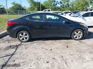 2011 Hyundai Elantra Ltd with VIN KMHDH4AE5BU143903, listed as a IAAI auction lot 41784556 with 182,009 mi miles. Bid and sale history available at carsss.com. Image 13.