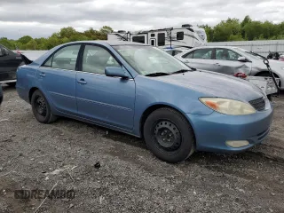 2004 Toyota Camry LE z VIN 4T1BE30K94U892207, wystawiony jako Copart lot #58406245 z przebiegiem 318 751 mil mil oraz Czysty tytuł • Clean title. Historia ofert i sprzedaży dostępna na DreamBid. Obrazek 4.