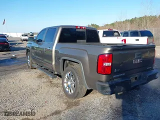 2015 GMC Sierra 1500 Denali with VIN 3GTU2WEC9FG355576, listed as a IAAI auction lot 41151606 with 115,017 mi miles. Bid and sale history available at carsss.com. Image 3.