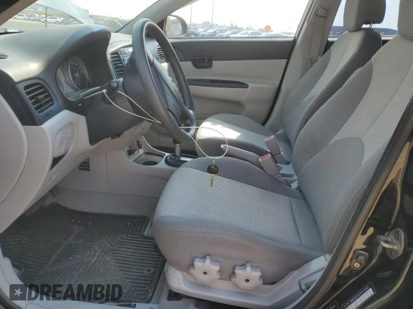 2007 Hyundai Accent GL with VIN KMHCN45C47U112467, listed as a Copart auction lot 64605364 with 236,196 mi miles and Salvage title. Bid and sale history available at DreamBid. Image 7.