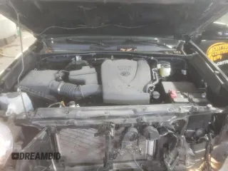 2023 Toyota Tacoma SR z VIN 3TYRZ5CN0PT032427, wystawiony jako Copart lot #87620985 z przebiegiem 32 010 mil mil oraz Szkoda całkowita • Salvage title. Historia ofert i sprzedaży dostępna na DreamBid. Obrazek 11.