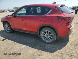 2019 Mazda CX-5 Grand Touring with VIN JM3KFBDM7K1668396, listed as a Copart auction lot 59732785 with 23,855 mi miles and Salvage title. Bid and sale history available at DreamBid. Image 2.