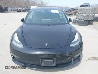 2020 Tesla Model 3 Standard Range Plus with VIN 5YJ3E1EAXLF643807, listed as a IAAI auction lot 41789406 with 49,256 mi miles. Bid and sale history available at carsss.com. Image 11.