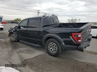 2021 Ford F-150 Raptor with VIN 1FTFW1RG3MFC62242, listed as a Copart auction lot 69325264 with 33,497 mi miles and Salvage Title. Bid and sale history available at carsss.com. Image 2.