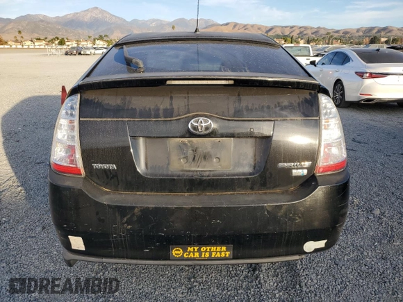 2005 Toyota Prius z VIN JTDKB20U253062362, wystawiony jako Copart lot #85383824 z przebiegiem 137 694 mil mil oraz Szkoda całkowita • Salvage title. Historia ofert i sprzedaży dostępna na DreamBid. Obrazek 6.