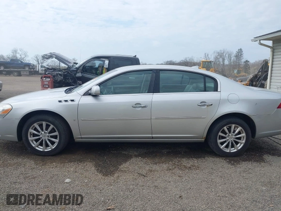2009 Buick Lucerne CXL with VIN 1G4HD57M79U141033, listed as a IAAI auction lot 42061042 with 161,021 mi miles. Bid and sale history available at carsss.com. Image 15.