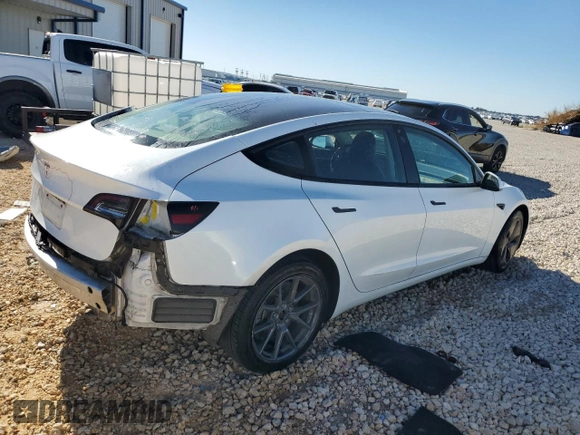 2021 Tesla Model 3 Standard Range Plus with VIN 5YJ3E1EA7MF089997, listed as a Copart auction lot 81528284 with 147,242 mi miles and Clean Title. Bid and sale history available at DreamBid. Image 3.