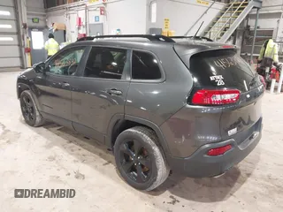 2016 Jeep Cherokee Latitude with VIN 1C4PJLCSXGW137190, listed as a IAAI auction lot 41563823 with 159,586 mi miles. Bid and sale history available at carsss.com. Image 3.