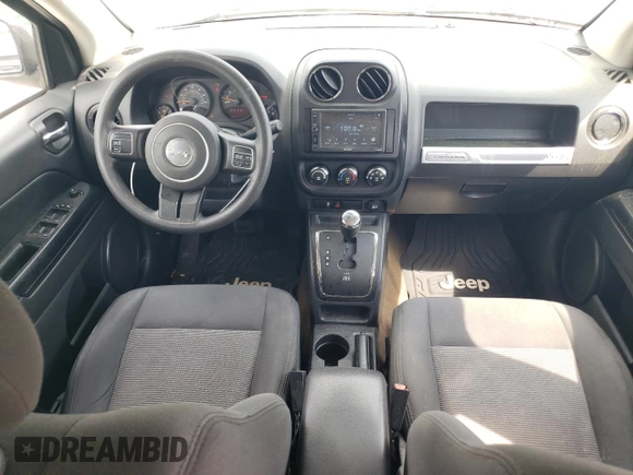 2017 Jeep Compass Sport z VIN 1C4NJCBB9HD117714, wystawiony jako Copart lot #52106065 z przebiegiem 169 246 mil mil oraz Szkoda całkowita • Salvage title. Historia ofert i sprzedaży dostępna na DreamBid. Obrazek 8.