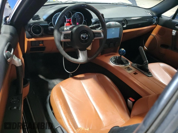 2007 Mazda MX-5 Miata Grand Touring with VIN JM1NC26F970127893, listed as a Copart auction lot 65293695 with 159,178 mi miles and Clean title. Bid and sale history available at DreamBid. Image 8.