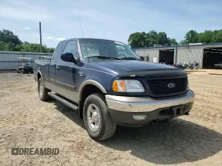 2002 Ford F-150 XL with VIN 1FTRX18L62NA69837, listed as a Copart auction lot 61581935 with 130,078 mi miles and Salvage title. Bid and sale history available at DreamBid. Image 13.