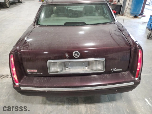 1997 Cadillac DeVille with VIN 1G6KD54Y6VU233829, listed as a Copart auction lot 85796664 with 217,823 mi miles and Salvage Title. Bid and sale history available at carsss.com. Image 6.