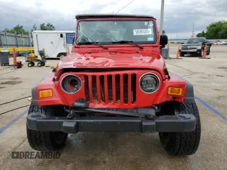 2005 Jeep Wrangler Sport z VIN 1J4FA49S75P317995, wystawiony jako Copart lot #58060055 z przebiegiem 189 332 mil mil oraz Szkoda całkowita • Salvage title. Historia ofert i sprzedaży dostępna na DreamBid. Obrazek 5.