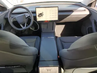 2025 Tesla Model 3 Long Range with VIN 5YJ3E1EA8SF890337, listed as a Copart auction lot 45023425 with 1,765 mi miles and Salvage Title. Bid and sale history available at DreamBid. Image 8.
