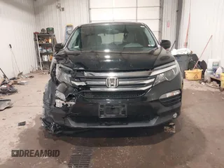 2018 Honda Pilot EX-L z VIN 5FNYF6H82JB014516, wystawiony jako IAAI lot #41615682 z przebiegiem 87 067 mil mil oraz . Historia ofert i sprzedaży dostępna na DreamBid. Obrazek 13.