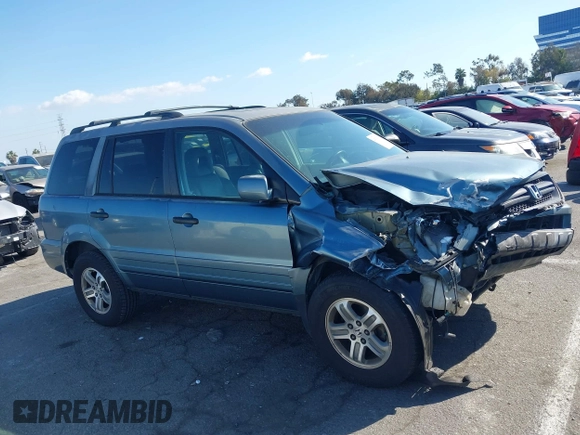 2005 Honda Pilot EX-L with VIN 2HKYF18565H534394, listed as a IAAI auction lot 41539630 with 168,384 mi miles. Bid and sale history available at carsss.com. Image 13.
