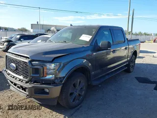 2018 Ford F-150 XL with VIN 1FTEW1EP9JFE03456, listed as a IAAI auction lot 41741500 with 104,123 mi miles. Bid and sale history available at carsss.com. Image 2.
