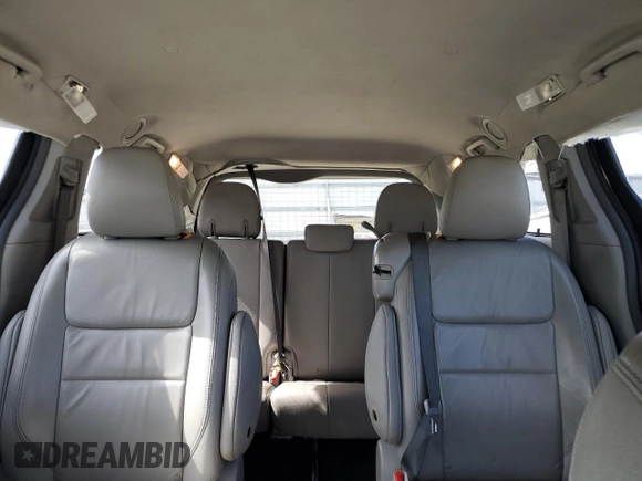 2015 Toyota Sienna XLE with VIN 5TDYK3DC5FS643985, listed as a Copart auction lot 56956505 with 179,131 mi miles and Salvage title. Bid and sale history available at DreamBid. Image 10.