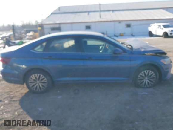 2021 Volkswagen Jetta S z VIN 3VWC57BU0MM054745, wystawiony jako IAAI lot #39772920 z przebiegiem 31 453 mil mil oraz . Historia ofert i sprzedaży dostępna na DreamBid. Obrazek 13.
