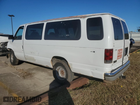 2002 Ford Econoline Passenger XL with VIN 1FBSS31S82HB36096, listed as a Copart auction lot 80654574 with 170,656 mi miles and Salvage title. Bid and sale history available at DreamBid. Image 2.