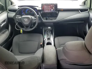 2021 Toyota Corolla Hybrid LE with VIN JTDEAMDE3MJ013373, listed as a Copart auction lot 48709785 with 136,422 mi miles and Salvage Title. Bid and sale history available at carsss.com. Image 8.