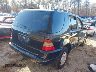 2000 Mercedes-Benz M-Class with VIN 4JGAB54E0YA146627, listed as a IAAI auction lot 41292173 with 116,790 mi miles. Bid and sale history available at carsss.com. Image 4.